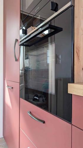 cuisine modernisée terracotta bois optimisation espace roncherolles